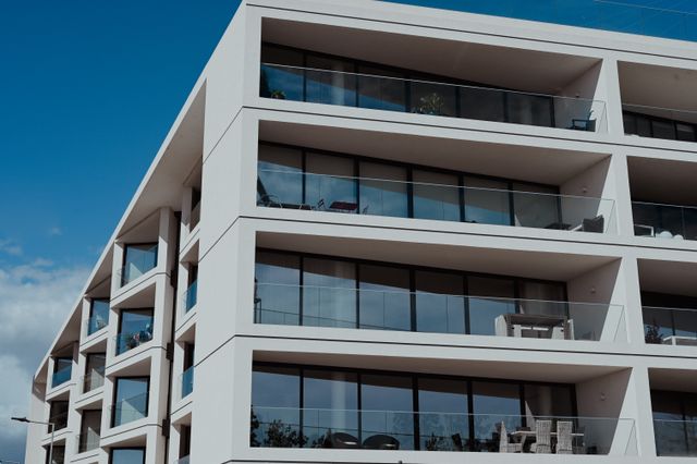 the exterior of a modern apartment building